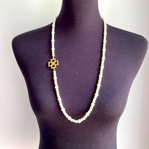 Long faux pearl necklace
